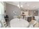 Bright dining area featuring a round table and natural light from a large window at 488 Seth Run, The Villages, FL 32163