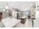 Spacious kitchen featuring stainless steel appliances and center island, perfect for entertaining at 488 Seth Run, The Villages, FL 32163