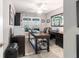 Home office featuring a ceiling fan, natural light, and plenty of room for working at 488 Seth Run, The Villages, FL 32163