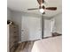 Bright bedroom with a fan, closet and dresser with drawers at 5133 Sw 41St Pl, Ocala, FL 34474