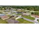 Enjoy a charming single-Gathering home nestled in a serene neighborhood, complete with lush greenery and tree-lined streets at 63 Walnut Crse, Ocala, FL 34480
