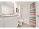 Bathroom features tile floors, vanity with sink, toilet and shower with tub at 7133 Sw 135Th Pl, Ocala, FL 34473