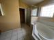 Bathroom with a shower and tub at 8100 Sw 56Th Ter, Ocala, FL 34476