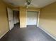 Bedroom featuring a closet and ceiling fan at 8100 Sw 56Th Ter, Ocala, FL 34476