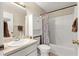 Bathroom with tile, toilet, shower, vanity and towel rack at 8732 Sw 60Th Cir, Ocala, FL 34476