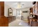 Bedroom with carpet, nice furniture, a ceiling fan and a closet at 8732 Sw 60Th Cir, Ocala, FL 34476