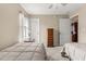 Bedroom featuring twin beds, carpeted floor, ceiling fan and closet at 8732 Sw 60Th Cir, Ocala, FL 34476