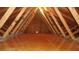 Spacious attic with wooden beams and plywood flooring at 8781 Sw 82Nd Court Rd, Ocala, FL 34481
