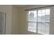 Bright bedroom with large window offering natural light and a view of the outdoors at 8781 Sw 82Nd Court Rd, Ocala, FL 34481