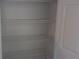 A walk-in closet with wire shelving providing ample storage space for an organized wardrobe at 8781 Sw 82Nd Court Rd, Ocala, FL 34481