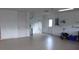 Spacious garage with epoxy flooring and ample storage at 8781 Sw 82Nd Court Rd, Ocala, FL 34481