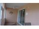 Enclosed lanai featuring tile flooring, a ceiling fan, and sliding glass doors at 8781 Sw 82Nd Court Rd, Ocala, FL 34481