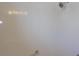 Clean shower stall with white tiles and a shower head providing a minimalist bathing space at 8781 Sw 82Nd Court Rd, Ocala, FL 34481