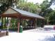 Large open pavilion with picnic tables provides an excellent space for outdoor gatherings at 9328 Sw 192Nd Court Rd, Dunnellon, FL 34432