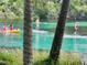 People kayak and paddle board on a clear river at 9328 Sw 192Nd Court Rd, Dunnellon, FL 34432