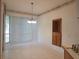 Bright dining area featuring a bay window and built in hutch with storage at 95 Hickory Loop, Ocala, FL 34472