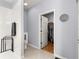Bathroom features a walk-in closet and a shower with white tile at 9551 Sw 92Nd Ter, Ocala, FL 34481