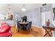 Inviting dining room features hardwood floors and a decorative light fixture above a table for six at 9551 Sw 92Nd Ter, Ocala, FL 34481