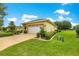 The house features an attached garage and well-maintained landscaping at 9551 Sw 92Nd Ter, Ocala, FL 34481