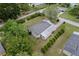 Overhead view of the home showing the roof, landscaping, and backyard at 10012 Sw 88Th Ct, Ocala, FL 34481