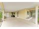 The covered carport features a spacious area, access doors to the home, and an open design at 10012 Sw 88Th Ct, Ocala, FL 34481
