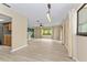 Spacious living room with mural and updated floors at 10012 Sw 88Th Ct, Ocala, FL 34481