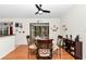 Cozy dining area with table, chairs, and view through to the living room at 10806 Sw 86Th Ave, Ocala, FL 34481