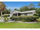 Charming single-story home with well-maintained landscaping, lush green lawn, and a welcoming curb appeal at 10806 Sw 86Th Ave, Ocala, FL 34481