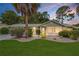 Charming single-story home with well-manicured lawn, mature landscaping, and inviting curb appeal at 10806 Sw 86Th Ave, Ocala, FL 34481