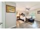 Spacious main bedroom boasts a ceiling fan, natural light, and an ensuite bathroom at 13131 Sw 73Rd St, Ocala, FL 34481