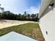 Image depicts a home's backyard ready for customization and with a view of the woods at 1390 Sw Obee Ridge Rd, Dunnellon, FL 34431