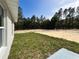 Expansive backyard featuring a combination of grassy areas and natural land perfect for outdoor enjoyment at 1390 Sw Obee Ridge Rd, Dunnellon, FL 34431