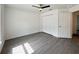 Spacious bedroom includes a ceiling fan, closet with plenty of storage, and neutral walls at 1390 Sw Obee Ridge Rd, Dunnellon, FL 34431