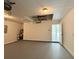 Spacious garage features bright lighting and plenty of room for storage and other projects at 1390 Sw Obee Ridge Rd, Dunnellon, FL 34431