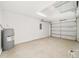 Spacious two car garage featuring neutral paint and concrete floor at 14690 Sw 24Th. Pl, Ocala, FL 34481
