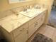 Bathroom vanity featuring a modern sink, tiled countertop, and ample storage space at 14695 Sw 112Th Cir, Dunnellon, FL 34432