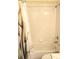 Clean bathroom with a tub, shower, and neutral tiled walls, providing a functional and tidy space at 14695 Sw 112Th Cir, Dunnellon, FL 34432
