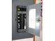 Image of the electrical panel of the house, with the door open to see the circuit breakers at 14695 Sw 112Th Cir, Dunnellon, FL 34432