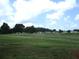 Wide view of the community, highlighting its well-maintained green spaces and serene setting at 14695 Sw 112Th Cir, Dunnellon, FL 34432