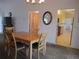 Cozy dining area open to the kitchen with a wooden table and chairs at 14695 Sw 112Th Cir, Dunnellon, FL 34432
