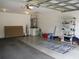 Spacious two car garage with room for storage, workbench and outdoor items at 14695 Sw 112Th Cir, Dunnellon, FL 34432
