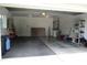 Spacious two car garage with a window, storage area and room to easily store your belongings at 14695 Sw 112Th Cir, Dunnellon, FL 34432