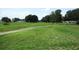 Lush green golf course featuring mature trees and well-maintained fairways at 14695 Sw 112Th Cir, Dunnellon, FL 34432
