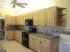 A well-equipped kitchen provides the perfect space for culinary creations and hosting gatherings at 14695 Sw 112Th Cir, Dunnellon, FL 34432