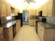 A well-lit kitchen offers updated appliances and plenty of counter space at 14695 Sw 112Th Cir, Dunnellon, FL 34432