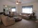 Comfortable living room offering ample seating and a ceiling fan at 14695 Sw 112Th Cir, Dunnellon, FL 34432