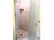 Shower with pebble flooring, corner caddy, and glass door, offers a spa-like experience at 14695 Sw 112Th Cir, Dunnellon, FL 34432