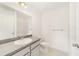 Bright bathroom with modern vanity, new toilet, and attractive lighting at 14885 Sw 23Rd Pl, Ocala, FL 34481