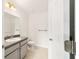 Modern bathroom features a stylish vanity, toilet, and updated fixtures at 14885 Sw 23Rd Pl, Ocala, FL 34481