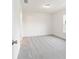 This bedroom features neutral carpeting and a window for natural light at 14893 Sw 23Rd Pl, Ocala, FL 34481